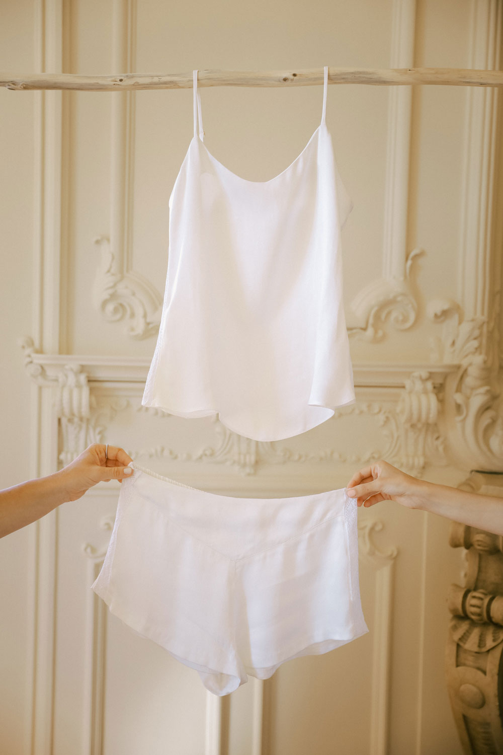 Leizi Camisole Pyjama Set seen from the front which consists in a white top and shorts pyjama  made with silk from orange peel.